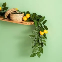 Vickerman 6' Artificial Green And Yellow Salal Leaf Lemon Garland. -Home Decor Shop GUEST 1910f952 a46e 4360 bff7 384e4ae4deca