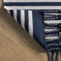 NuLOOM Rowen Striped Cotton Tassel Area Rug 20 NuLOOM Rowen Striped Cotton Tassel Area Rug -Home Decor Shop GUEST c93c8d8d df14 46c2 89e3 8537d50ab2ba